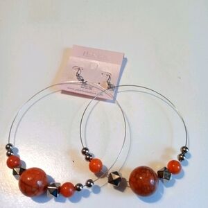 Brand new silver and orange big earrings